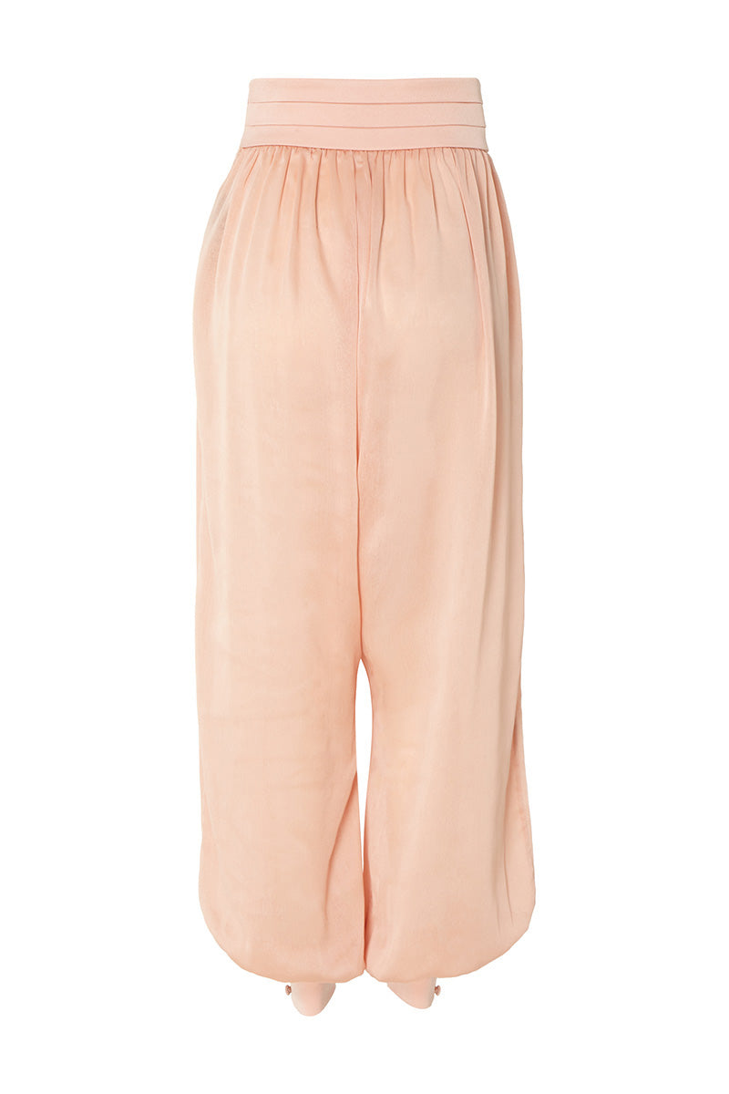 Studio NK Bloom Peach Pants, stylish women's trousers in a soft peach color, featuring a comfortable fit and modern design.