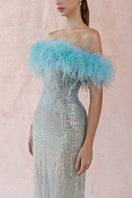 Blue feather sequin gown by HACCHIC COUTURE featuring shimmering blue feathers and elegant design for formal occasions.
