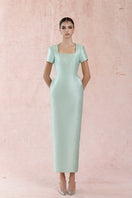 Blue minimal square neck gown by HACCHIC COUTURE, featuring a sleek design and elegant fit, displayed on a model.