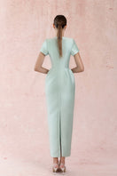 Blue minimal square neck gown by HACCHIC COUTURE, featuring a sleek design and elegant fit, shown on a model.