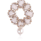 White flow brooch by Aidan & Ice, elegant floral lapel pin with intricate details, suitable for adding a sophisticated touch to outfits.