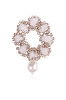 White flow brooch by Aidan & Ice, elegant floral lapel pin with intricate details, suitable for adding a sophisticated touch to outfits.