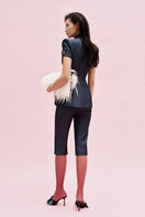 Jenny K Tran Bradford Shorts, casual denim shorts with distressed details and frayed hem, perfect for summer wear.