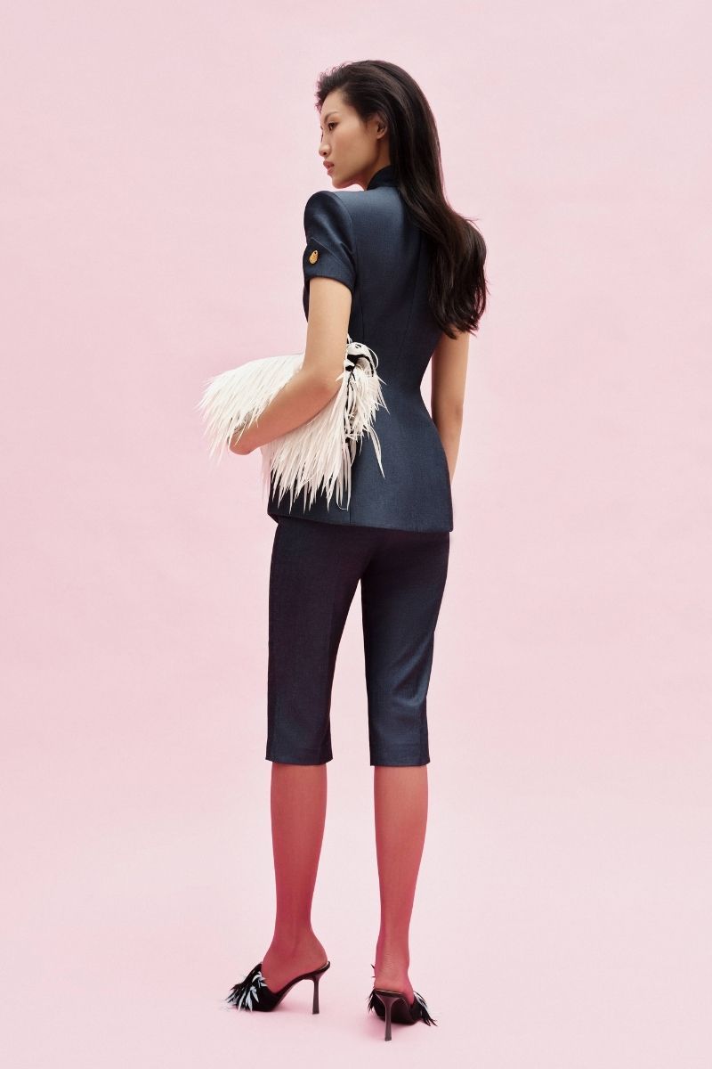 Jenny K Tran Bradford Shorts, casual denim shorts with distressed details and frayed hem, perfect for summer wear.