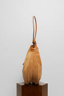Beige suede boho shoulder bag by Folklore The Label with woven strap and relaxed style.