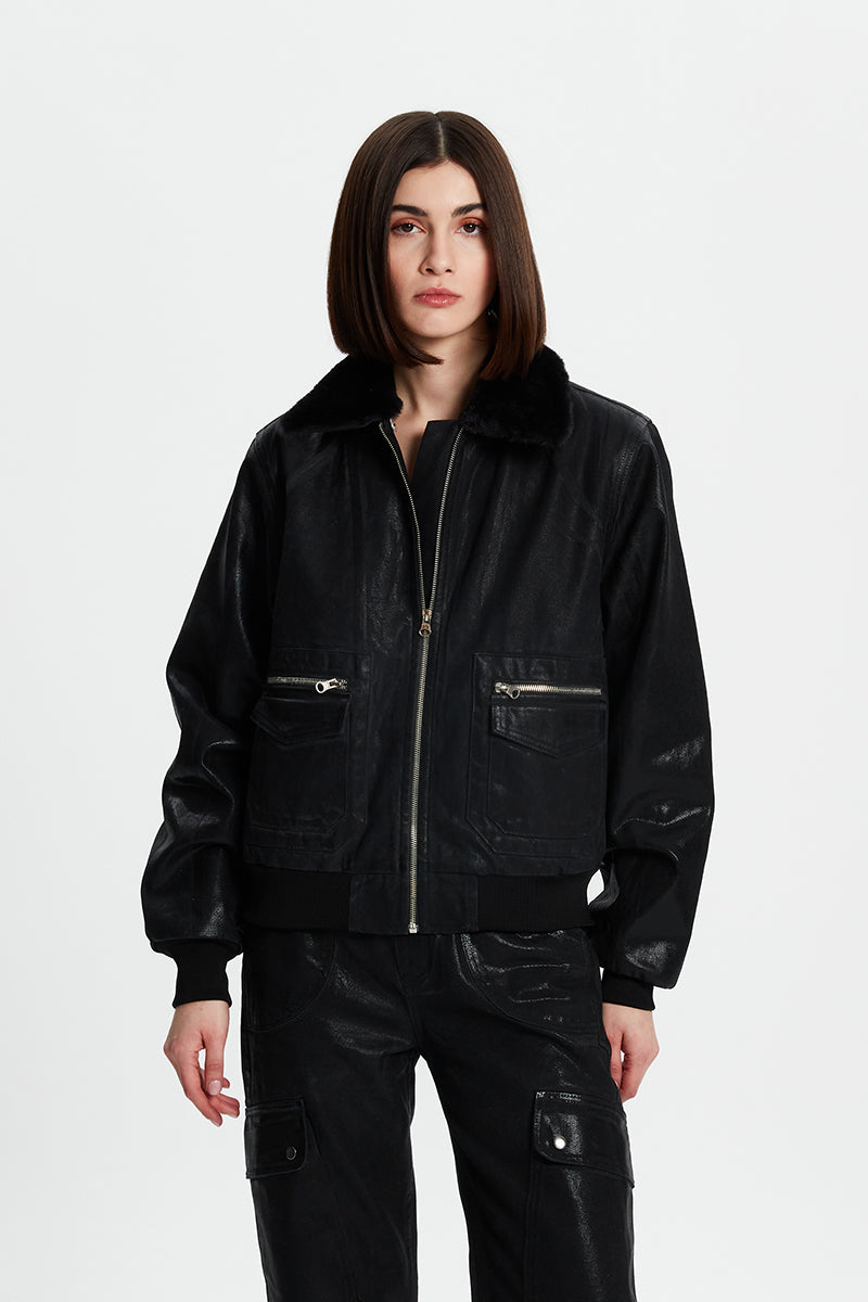 Metallic coated jacket from Bassigue, stylish outerwear with a shiny finish, shown in a front view with zipper details.