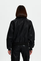 Metallic coated jacket from Bassigue, stylish and shiny outerwear with a modern metallic finish and tailored fit.