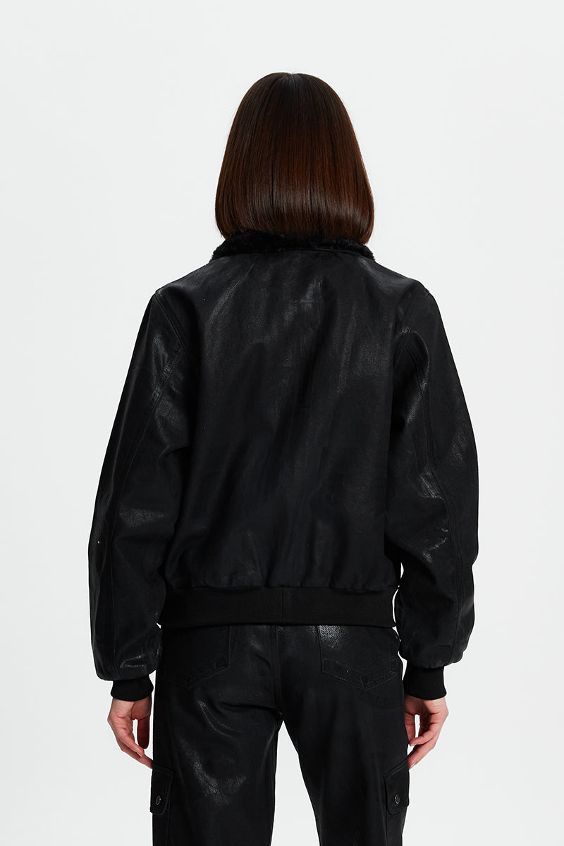 Metallic coated jacket from Bassigue, stylish and shiny outerwear with a modern metallic finish and tailored fit.