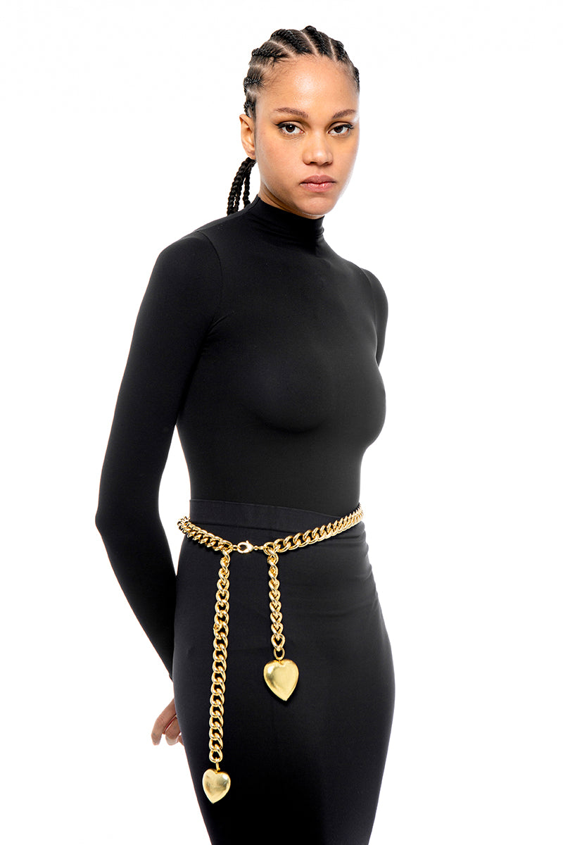 Gold Cuore belt by Silvia Gnecchi featuring a heart-shaped buckle, stylish accessory for elegant outfits.