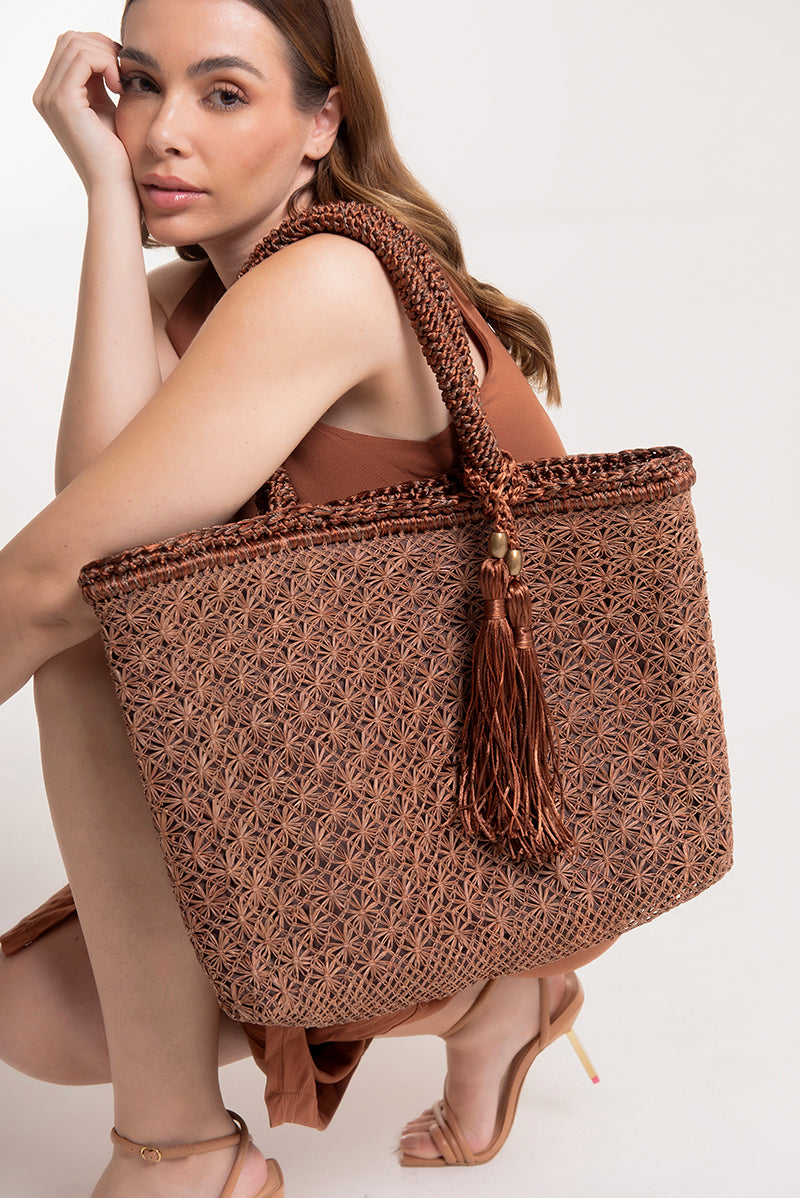 Brown Buritirana shoulder bag by Mara Brazil with woven design and leather strap, stylish and eco-friendly accessory.