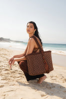 Brown Buritirana shoulder bag by Mara Brazil featuring woven leather details and a stylish, handcrafted design.