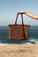 Mara Brazil Buritirana shoulder bag in brown leather with woven details, stylish and durable for everyday use.