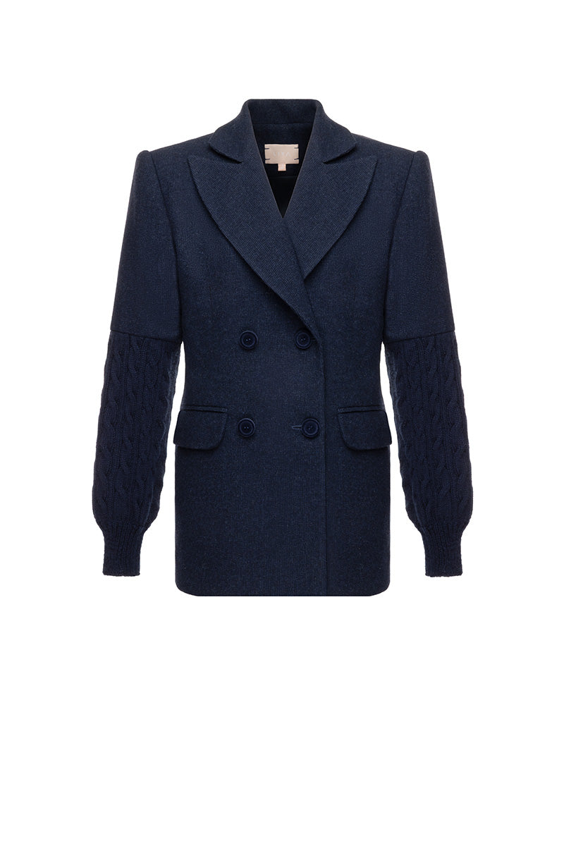 Navy tailored sleek blazer by Liya featuring a fitted design and classic lapel, displayed on a hanger.