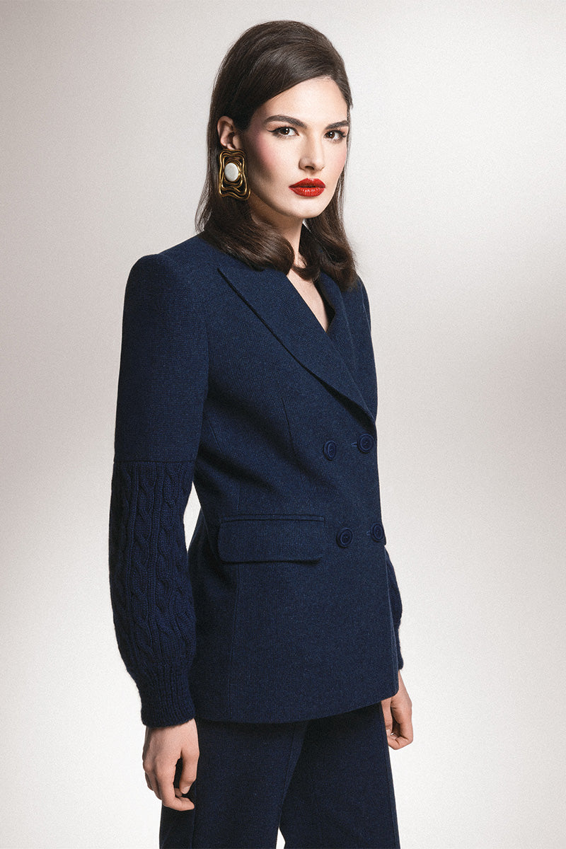Navy tailored sleek blazer by Liya, featuring a fitted design with classic lapels and structured shoulders.