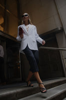 Black OPHELINNA sandals by ALTA with stylish heels, open-toe design, and sleek straps for a modern, sophisticated look.