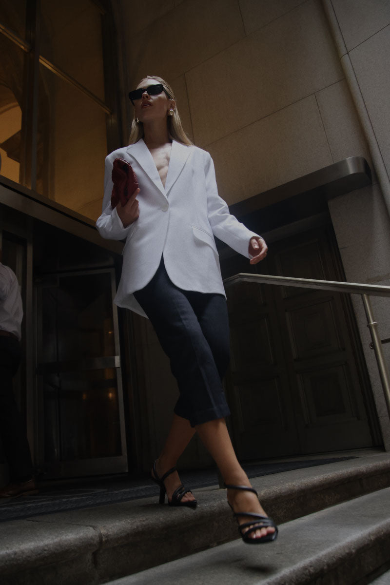 Black OPHELINNA sandals by ALTA with stylish heels, open-toe design, and sleek straps for a modern, sophisticated look.