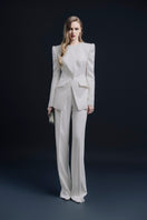 White Montpellier jacket by LEKIEU, featuring a stylish design with a sleek fit and modern detailing.