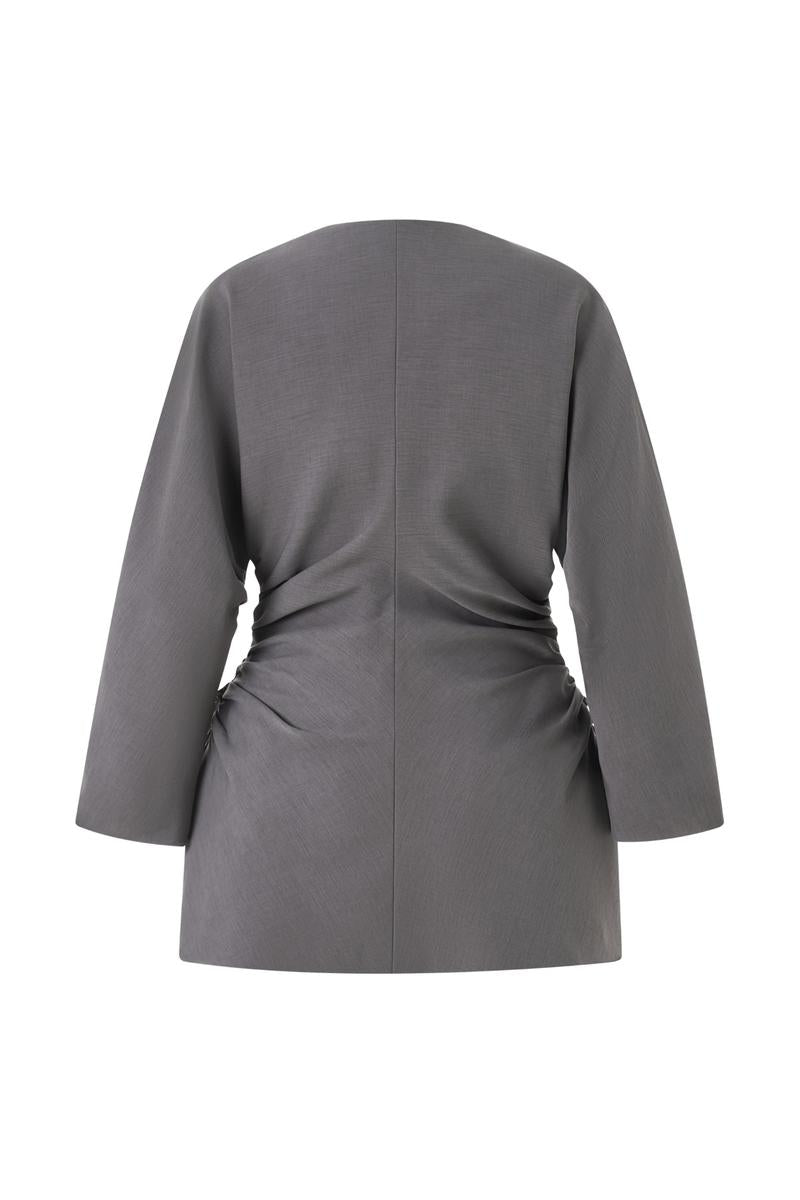 Gray Lecia long sleeve shirt with a fitted design, shown on a model with a round neckline and casual style.