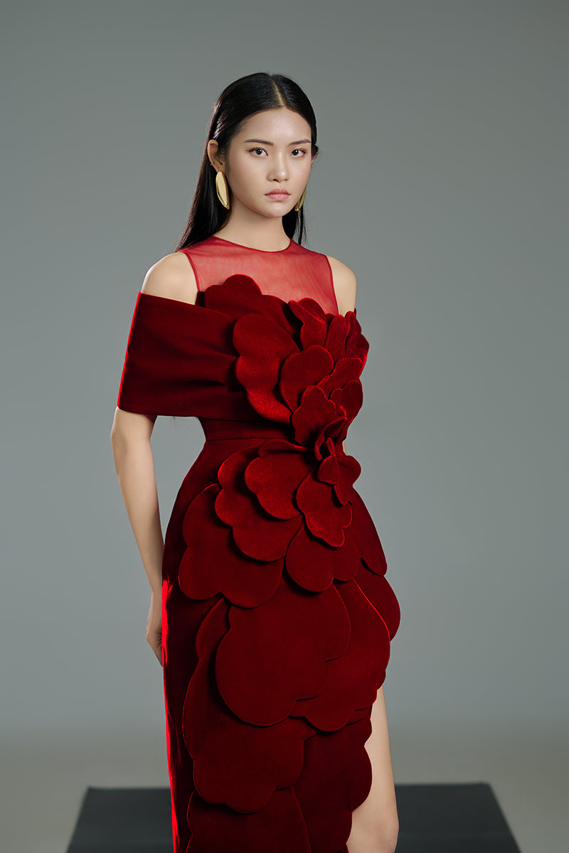 Red rose velvet gown by Happy Clothing featuring a flowing design and elegant neckline, perfect for formal occasions.
