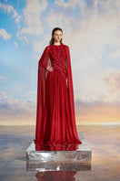 Elegant KERENZA crepe mixed chiffon pleated gown by 21Six, featuring flowing fabric and sophisticated design.