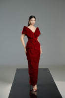 Red velvet petal structured gown by Happy Clothing, showcasing elegant design and intricate detailing on the dress.