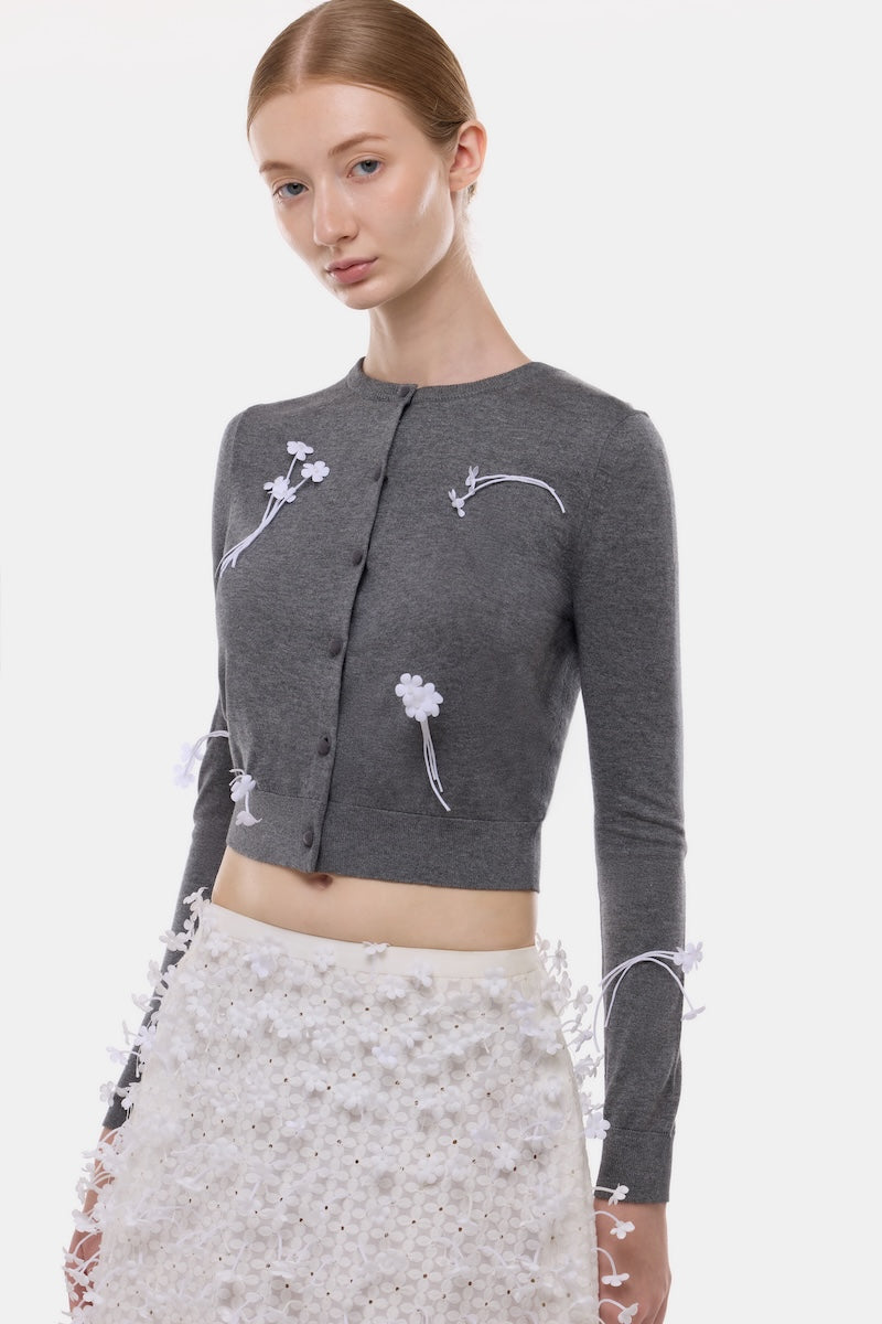 Gray 3D floral cardigan by Montsand, lightweight knit top with textured floral pattern and relaxed fit.