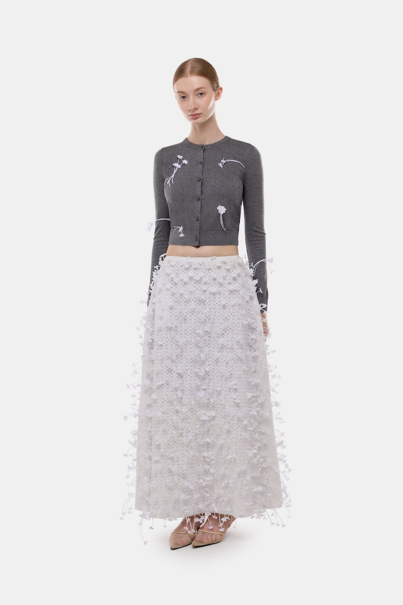 Gray 3D floral cardigan by Montsand, soft knit top with intricate floral pattern, long sleeves, and cozy fit.