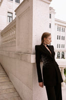 LEKIEU Cienne black blazer jacket, tailored fit with notch lapel collar, displayed on a hanger.