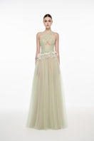 JOSÉPHINE Lyra mint gown with elegant flowing fabric and fitted bodice, perfect for formal occasions.