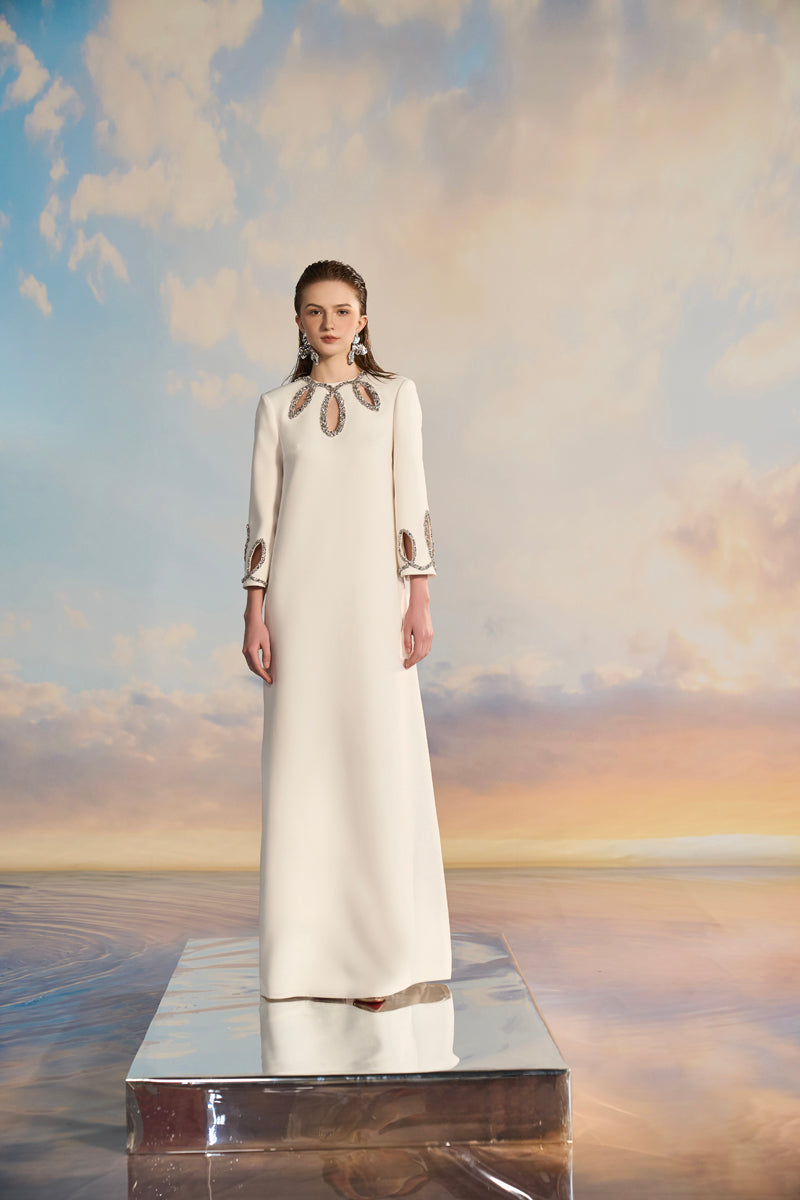Elegant ADELA crepe cut-out gown by 21Six featuring sleek design and stylish cut-outs, perfect for formal occasions.