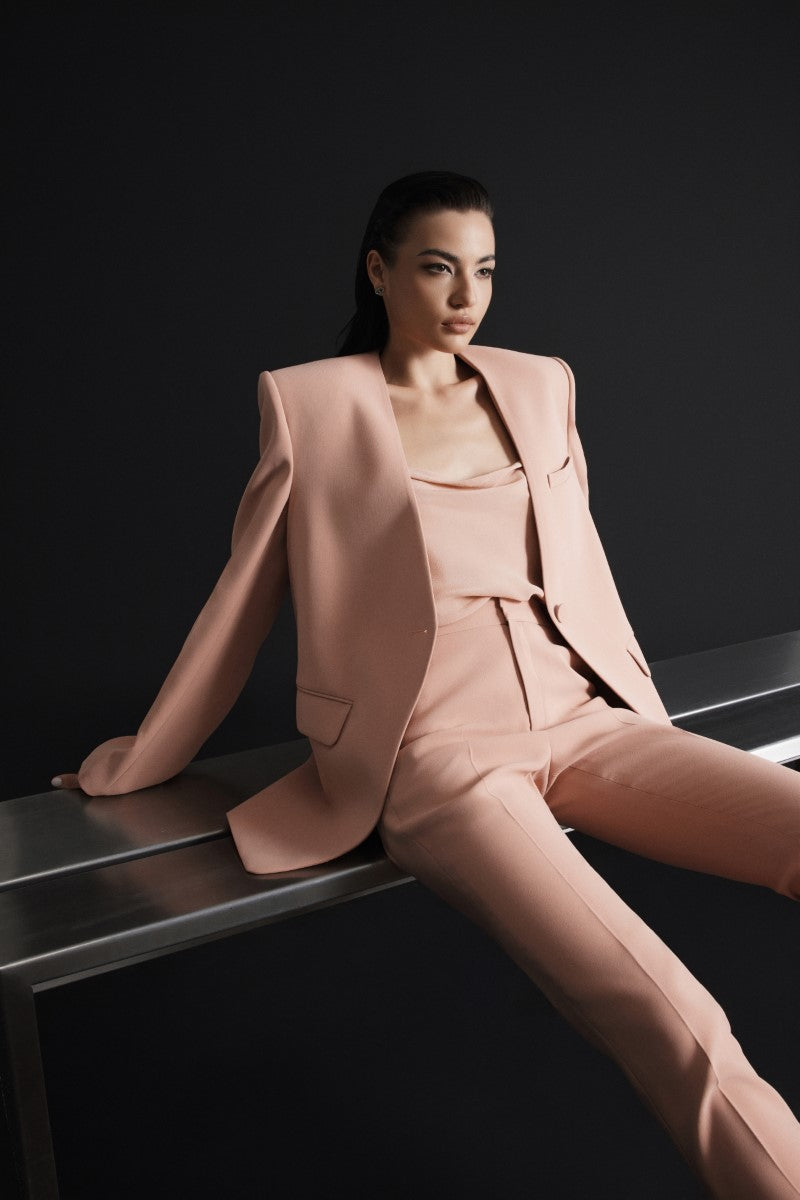 LEKIEU Cheddar Coral blazer featuring a tailored fit and vibrant color, perfect for a stylish and professional look.