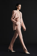 LEKIEU Cheddar Coral blazer with tailored fit, featuring a vibrant coral color and sleek lapel design, ideal for stylish office wear.