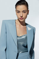 LEKIEU Grosvenor baby blue blazer for children, tailored fit with lapel collar and button closure, stylish and comfortable for kids.