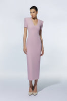 Sheffield pale pink midi dress by LEKIEU, featuring a flowing fabric and elegant design, displayed on a mannequin.