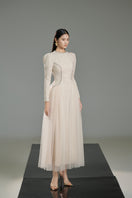 White tweed A-line gown by Happy Clothing, featuring a classic design and elegant fit, shown on a model.
