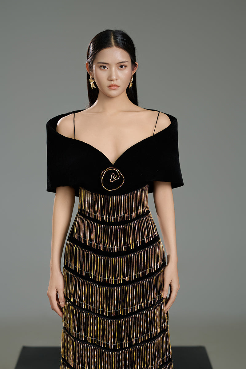 Black velvet gown with cold shoulder sleeves and trumpet silhouette by Happy Clothing, elegant formal dress for special occasions.