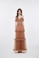 Joséphine Marilyn Maxi Dress in flowy fabric with a fitted waist and elegant neckline, perfect for summer occasions.