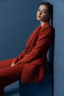 LEKIEU HAIZEA burnt orange blazer with tailored fit, stylish lapels, and sleek design, perfect for professional or casual wear.