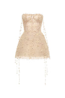 Beige floral string mini dress by Montsand, featuring a fitted silhouette and delicate floral print, perfect for warm weather.