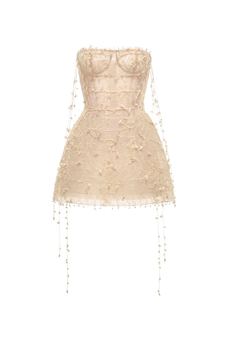 Beige floral string mini dress by Montsand, featuring a fitted silhouette and delicate floral print, perfect for warm weather.