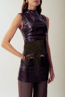 Millanne Tale Babru brown clutch bag with black and gold accents, featuring a sleek compact design for elegant occasions.