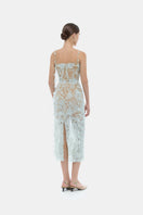 Baby blue beaded lace pencil gown by Montsand, showcasing intricate beadwork and elegant lace design on a fitted dress.
