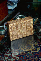 Brown Sarah's Bag backgammon clutch with decorative design, compact size, and stylish storage for game pieces and essentials.