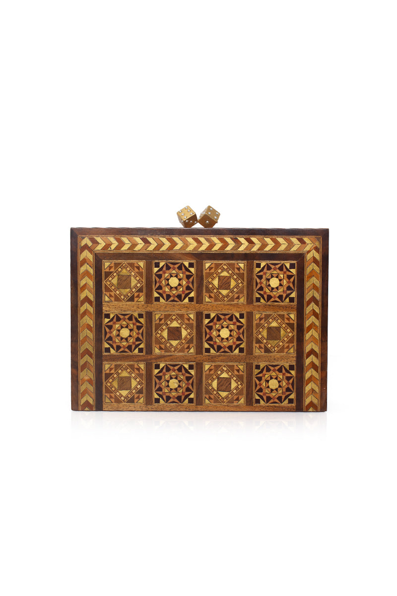 Sarah's Bag backgammon clutch with mother-of-pearl dice, featuring a stylish brown leather exterior and intricate game design.