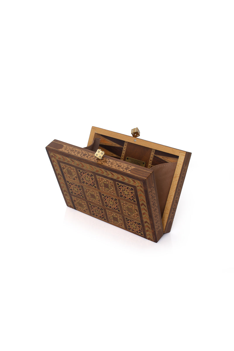 Sarah's Bag backgammon clutch with mother-of-pearl dice design, brown faux leather exterior, stylish and compact accessory.