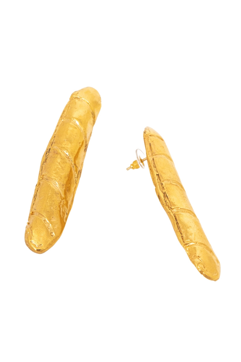 Gold baguette earrings by Oz Objects featuring sleek, geometric design with sparkling baguette-cut stones.