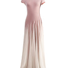 White and orange baklava-inspired maxi dress by YASSMIN SALEH, featuring flowing fabric and intricate design details.