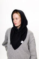 Black balaclava hat by LE SH KA, showing close-up of snug fit and breathable fabric for cold weather protection.