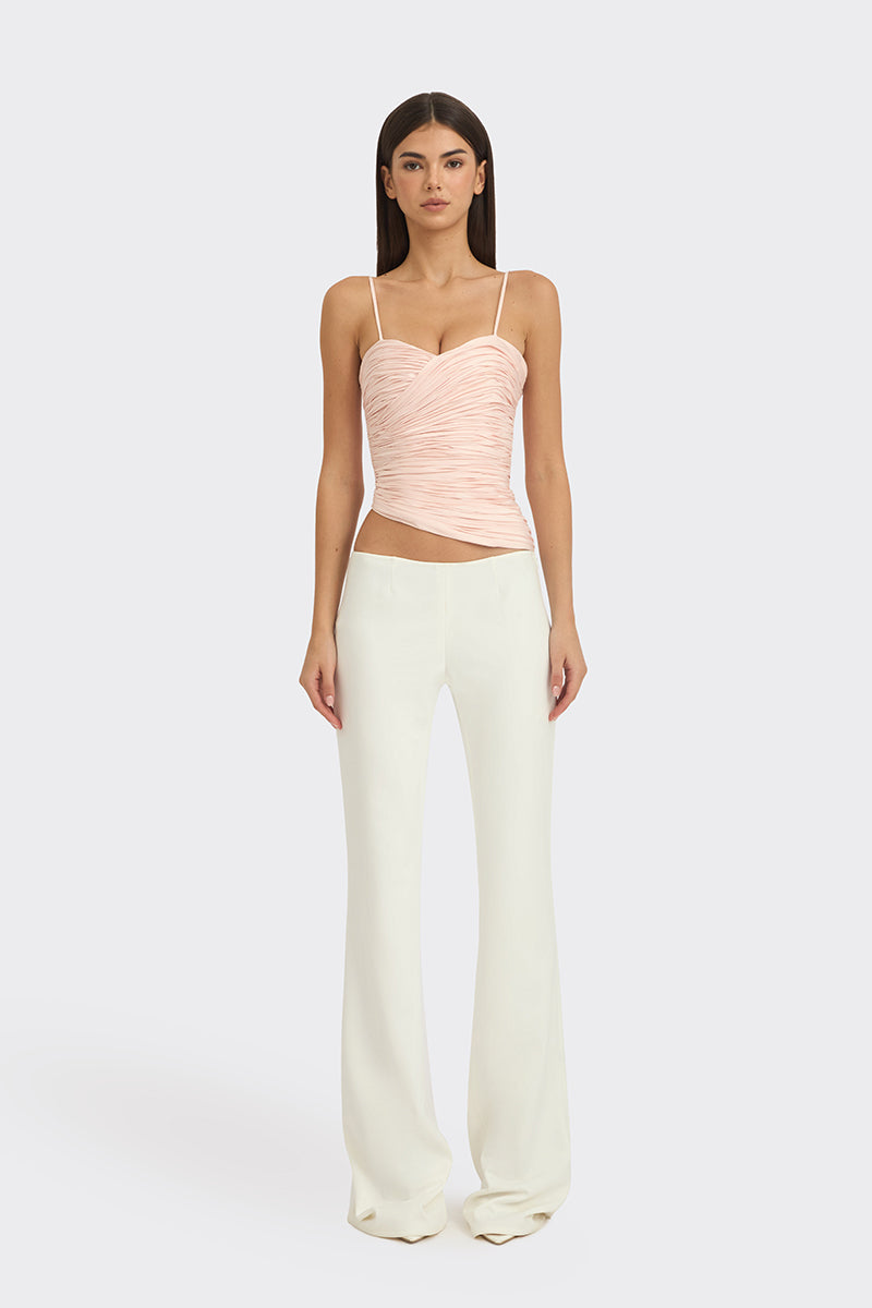 Light pink balloon-draped bustier top by Stolen Stores, featuring a fitted silhouette and stylish design.
