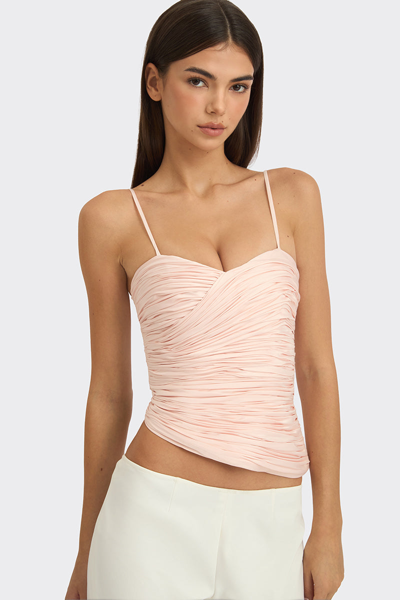 Light pink balloon draped bustier top by Stolen Stores, featuring a fitted silhouette and unique draped fabric design.